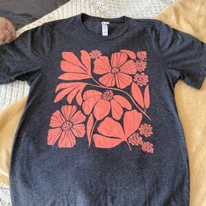 Bella canvas dark blue shirt with red flower design on front